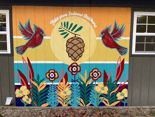 spacious skies sandy run campground mural with logo in Fayetteville, North Carolina